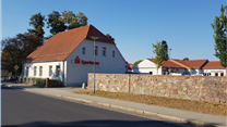 Продаётся торговый центр с якорным арендатором в пригороде Берлина.